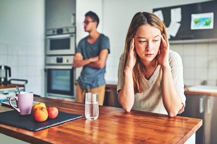 Shot of a couple having a disagreement at home