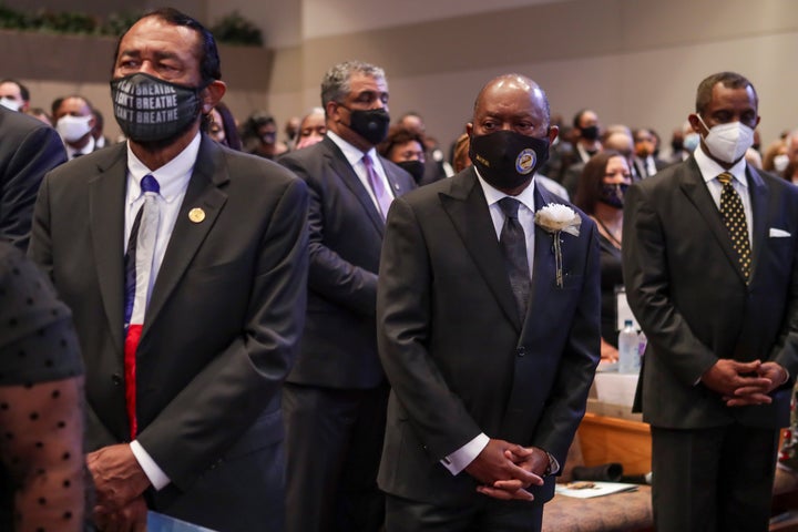 Congressman Al Green (L)D-TX and Houston mayor Sylvester Turner watch the family enter the sanctuary during the funeral for George Floyd on June 9, 2020, at The Fountain of Praise church in Houston, Texas. - George Floyd will be laid to rest Tuesday in his Houston hometown, the culmination of a long farewell to the 46-year-old African American whose death in custody ignited global protests against police brutality and racism. Thousands of well-wishers filed past Floyd's coffin in a public viewing a day earlier, as a court set bail at $1 million for the white officer charged with his murder last month in Minneapolis. (Photo by Godofredo A. VASQUEZ / POOL / AFP) (Photo by GODOFREDO A. VASQUEZ/POOL/AFP via Getty Images)