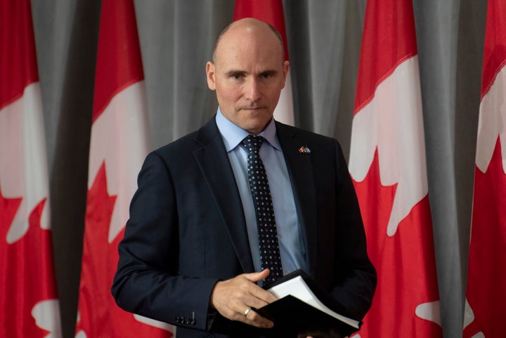 President of the Treasury Board Jean-Yves Duclos takes his seat before a news conference in Ottawa on June 9, 2020.