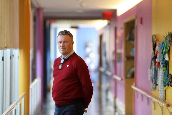 David Sheard, the creator of the Butterfly Household Model of Care, in the hall of the Redstone dementia unit at Malton Village in Mississauga, Ont.