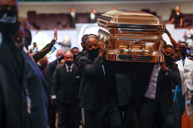 Pallbearers carry George Floyd's casket out after services Tuesday at The Fountain of Praise church in Houston.