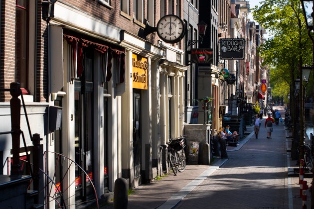 Amsterdam's red-light district is nearly deserted on April 24 after the Dutch government imposed regulations...