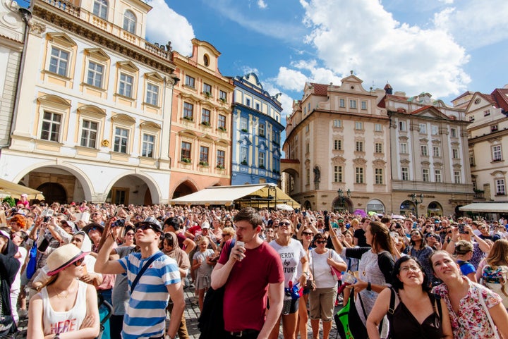 A crowd of tourists in the Old Town of Prague.