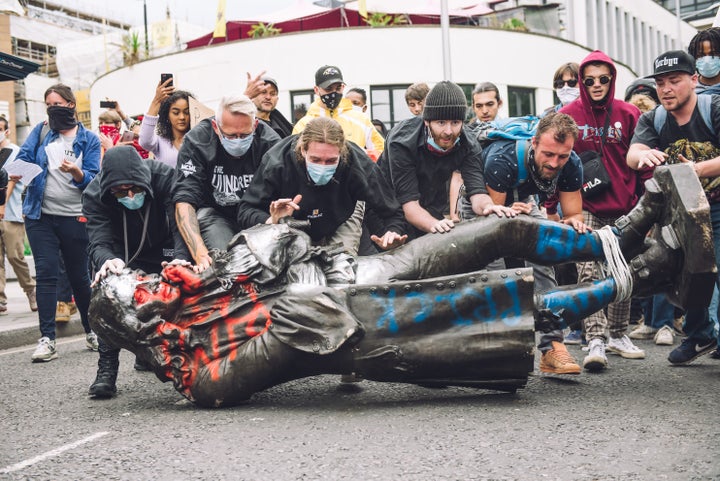 Protesters transporting the statue of Colston towards the river Avon.