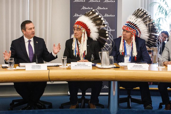 Alberta Premier Jason Kenney, left, sits with Grand Chief Wilton Littlechild, centre, Grand Chief Arthur Noskey, right, during a meeting in Edmonton with First Nations leaders about increasing Indigenous participation in the economy on June 10, 2019.