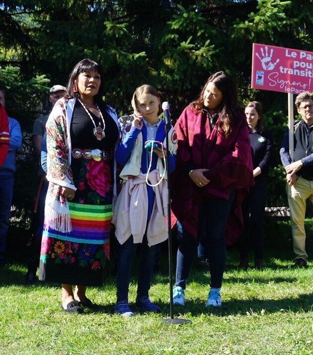 Alberta Regional Chief Marlene Poitras, left, stands with activist Greta Thunberg, centre, at a climate rally in Montreal in 2019.