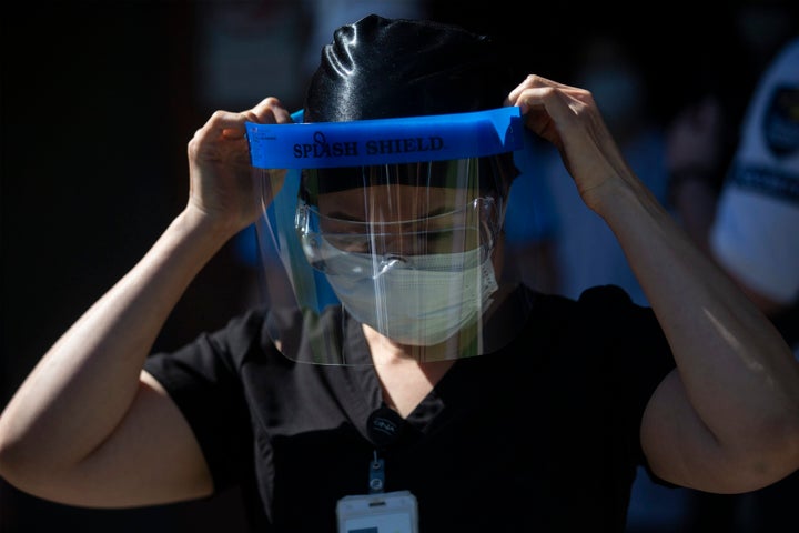 Registered nurse Shekiba Khedri, who works at Birchmount Hospital in Scarborough, Ont. is photographed wearing personal protective equipment on June 8, 2020.