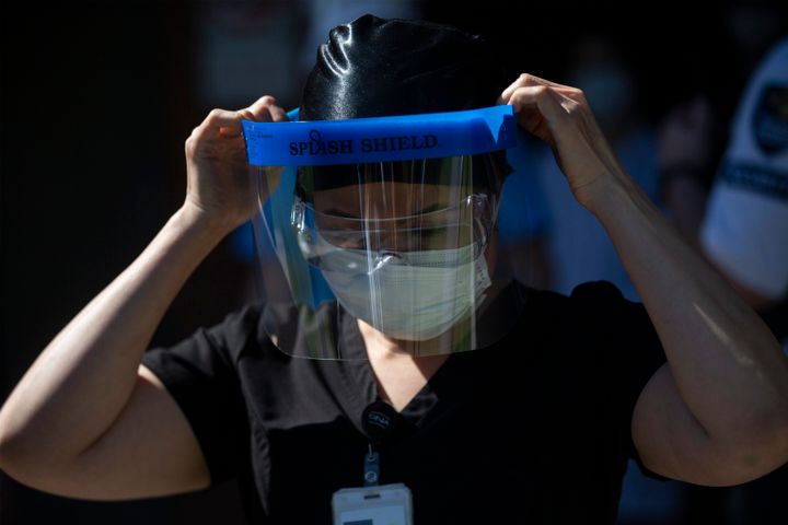Registered nurse Shekiba Khedri, who works at Birchmount Hospital in Scarborough, Ont. is photographed wearing personal protective equipment on June 8, 2020. 