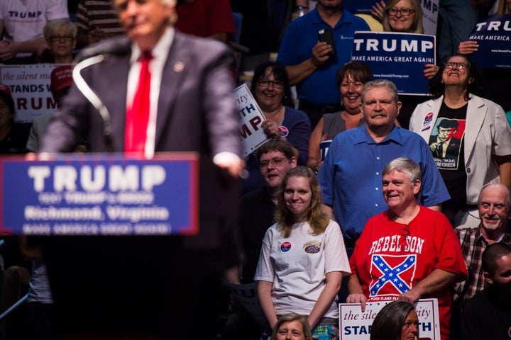 A supporter wears a Confederate flag shirt as Donald Trump speaks at a campaign rally on June 10, 2016, in Richmond, Virginia