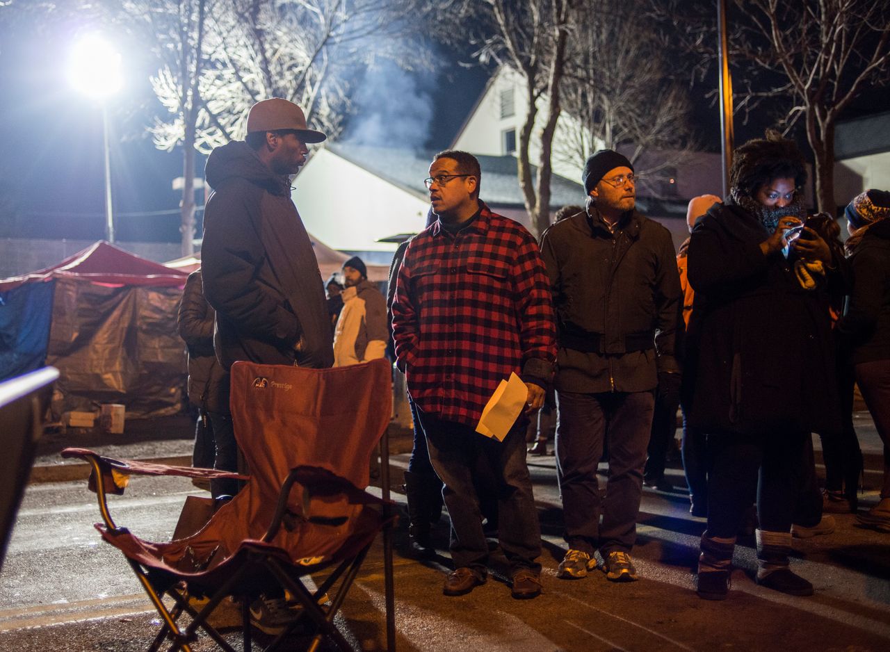 Then-Rep. Ellison visits a Black Lives Matter encampment in Minneapolis in November 2015. His turn against the encampment remains controversial.