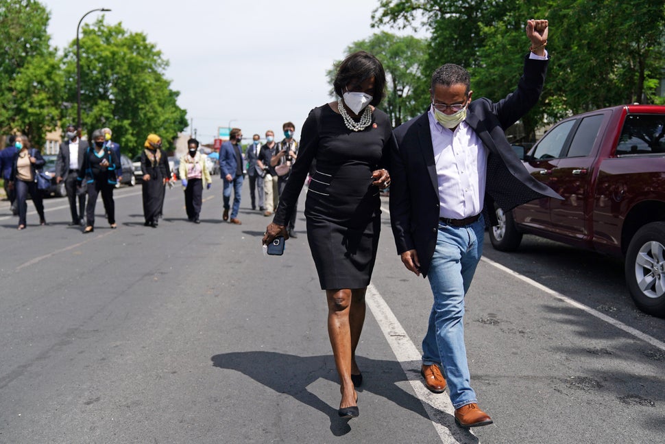 Ellison pumped his fist to cheers from onlookers after he and members of the Congressional Black Caucus visited the site of G