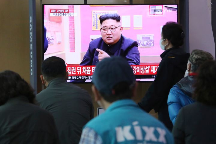 People watch a TV showing a file image of North Korean leader Kim Jong Un during a news program at the Seoul Railway Station in Seoul, South Korea, Saturday, May 2, 2020. (AP Photo/Ahn Young-joon)