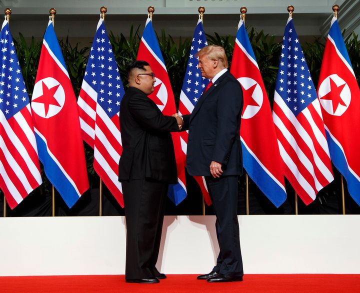 In this June 12, 2018, file photo, North Korean leader Kim Jong Un, left, and U.S. President Donald Trump shake hands prior to their meeting on Sentosa Island in Singapore. (AP Photo/Evan Vucci, File)