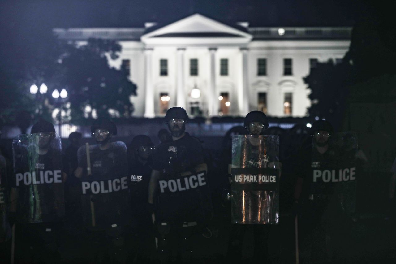 Police take security measures near White House during a protest over the death of George Floyd.