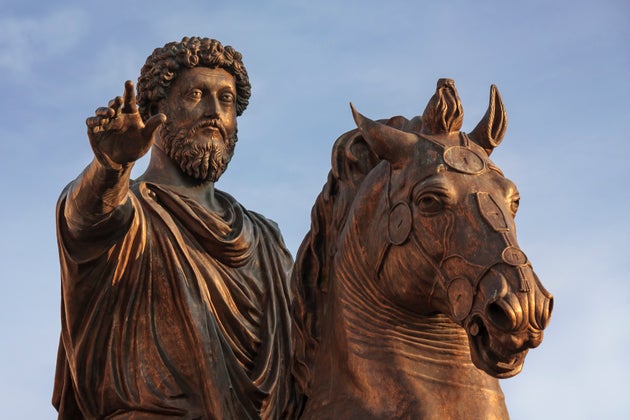 This sculpture, a bronze replica of an ancient statue of the Roman emperor, is located in the center...