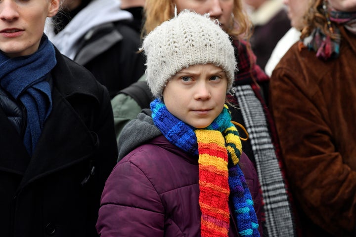 Swedish climate activist Greta Thunberg looks on as she takes part in a "Youth Strike 4 Climate" protest march on March 6, 2020 in Brussels.