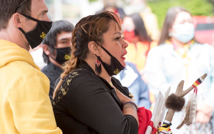 Chantel Moore's mother Martha Martin reacts during a healing ceremony in Edmundston, N.B. on June 13, 2020. 