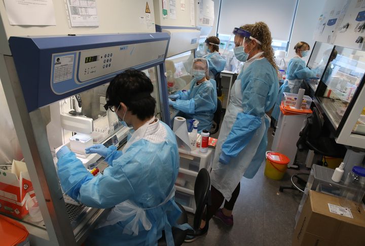 Scientists whilst working at the Lighthouse Laboratory at the Queen Elizabeth University Hospital in Glasgow.