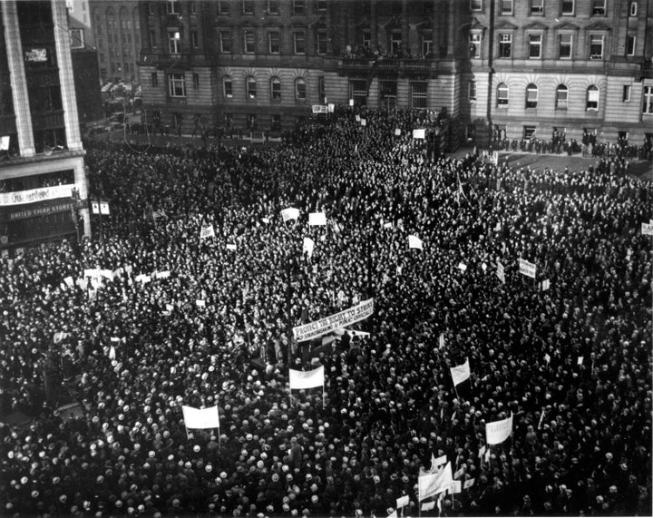 A mass demonstration against police eviction of sit-down strikers in Detroit, Michigan, on March 24, 1937. (AP Photo)