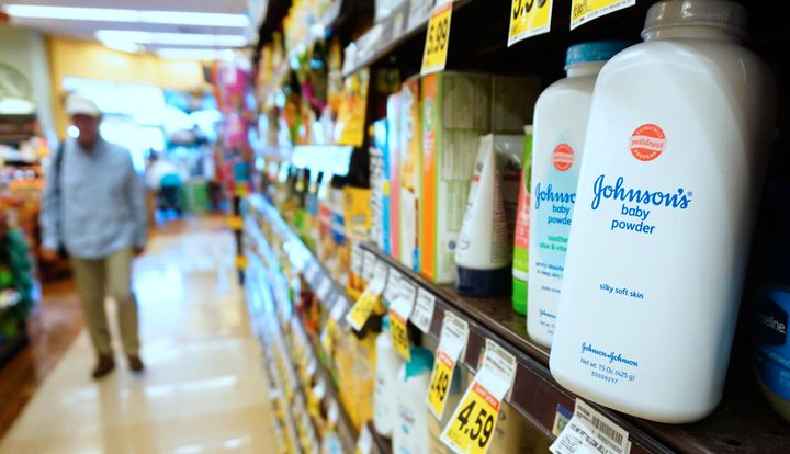 Johnson's baby powder sits on a supermarket shelf in August 2017, when the company was ordered to pay $417 million to a woman who claimed she developed terminal ovarian cancer after using the company's talc-based products. The case was one of many lawsuits brought nationwide alleging the company failed to warn consumers of the risk of cancer from talc in its products.