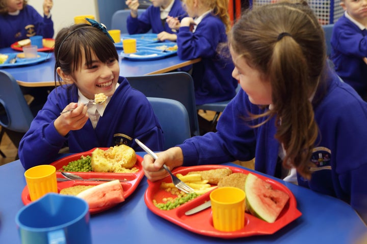 Children eating lunch at school