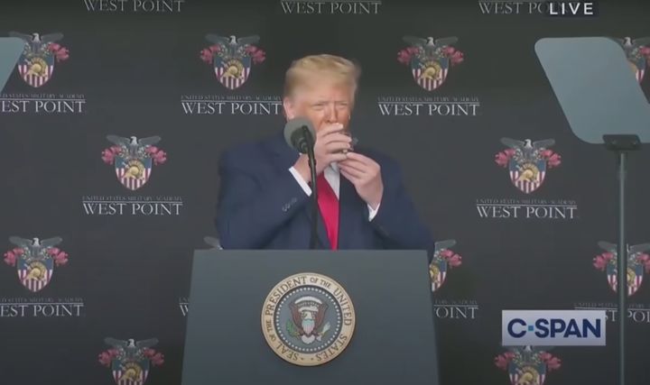 The president -- just normally using two hands to drink a glass of water. Nothing to see here.
