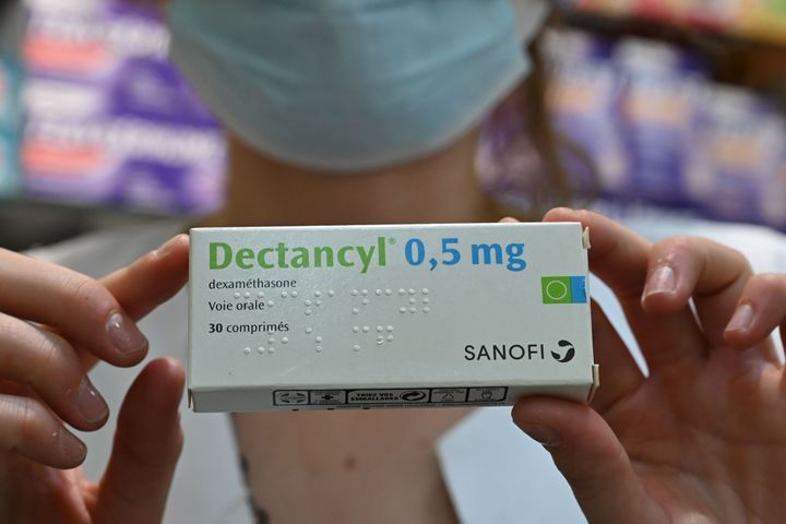 A picture taken on June 16, 2020 in Paris shows a box of Dectancyl, a drug manufactured by Sanofi containing dexamethasone.