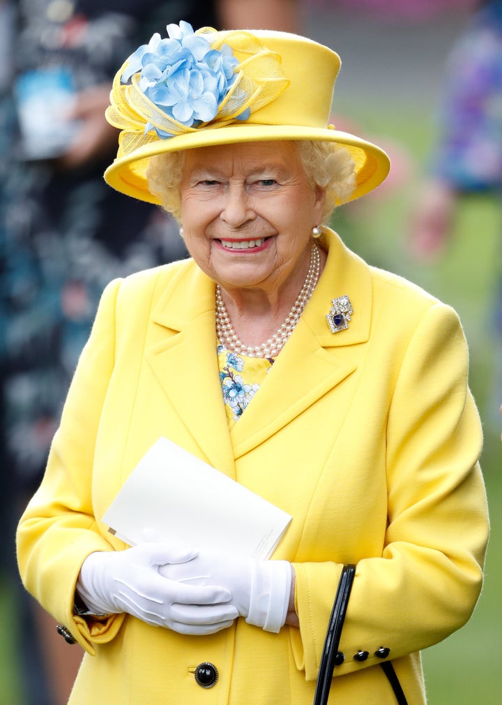 Queen Elizabeth II watches her horse 'Fabricate' run in the Wolferton Stakes on day 1 of Royal Ascot on June 19, 2018. 