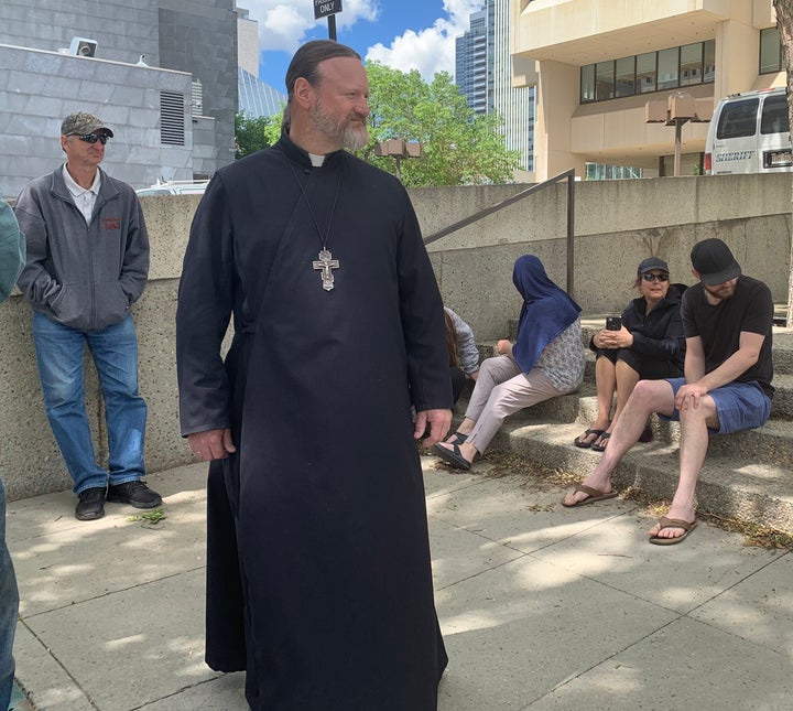 Father Mark Sych was at the Edmonton courthouse in support of Anthony Bilodeau and his family.