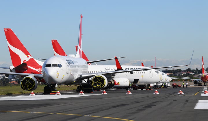 Qantas Boeing 737-800 aircraft parked on the east-west runway at Sydney's International airport on May 20, 2020 in Sydney, Australia. 