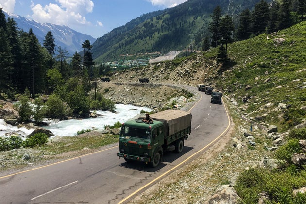 An Indian army convoy makes way towards Leh on June 17,