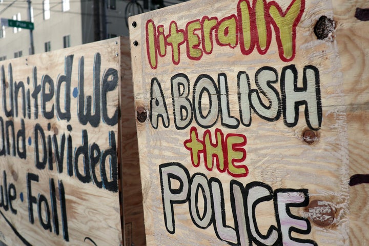 Graffiti on a barricade inside the Capitol Hill Occupied Protest in Seattle. The area surrounding Seattle's East Precinct police station is operating as a semi-autonomous jurisdiction outside the control of state authorities.