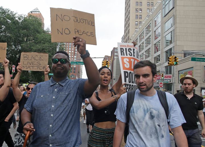 Activists in New York City before marching to Times Square to protest the police-involved shootings of Philando Castile and Alton Sterling in 2016.