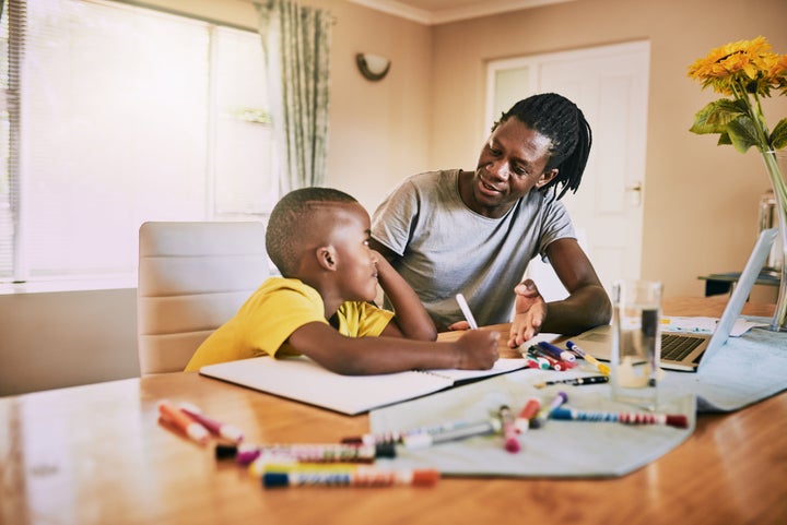 The writer's husband has more time to spend with his son now that he works from home.