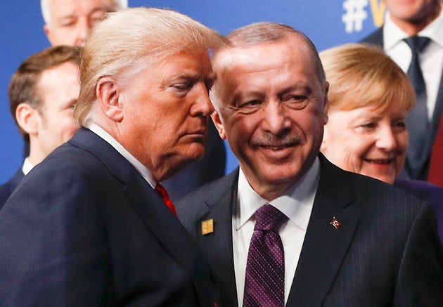 Donald Trump with Turkey's President Recep Tayyip Erdogan at the NATO summit, with German Chancellor...