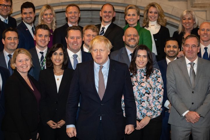 Prime minister Boris Johnson alongside newly elected Conservative MPs in December