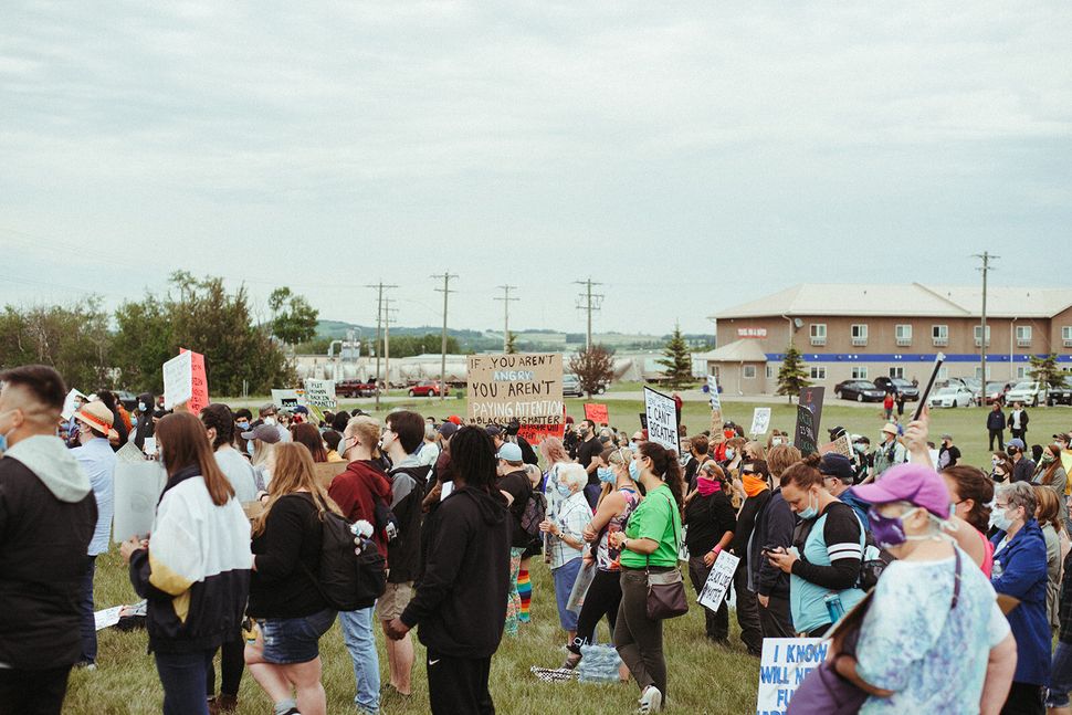 Hundreds gathered for a Black Live Matters event in Innisfail, Alta. on June 13, 2020.