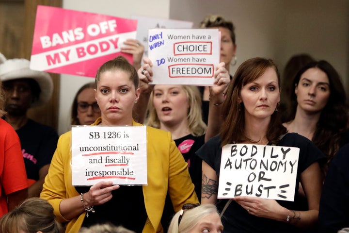 In this 2019 file photo, people wait for a Senate hearing to begin to discuss a fetal heartbeat abortion ban.