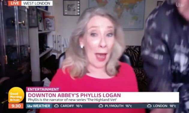 Downton Abbey Star Phyllis Logan’s Dressing Gown-Clad Husband Crashes Lorraine Interview