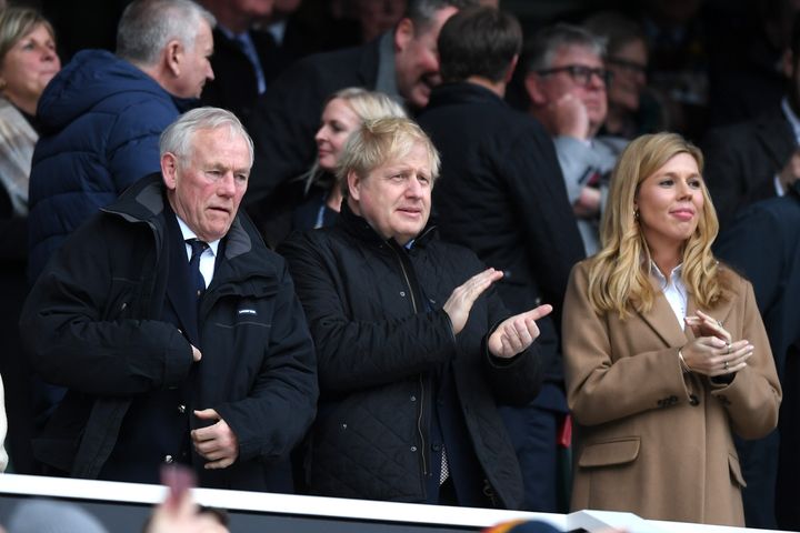 Boris Johnson, pictured with his partner Carrie Symonds in the stands during the 2020 Guinness Six Nations match between England and Wales, is a keen rugby fan.