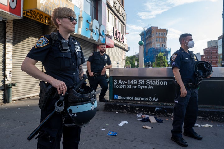 New York officers watch for a protest against racial injustice and police brutality at the retail and restaurant heart of the South Bronx on June 4. 