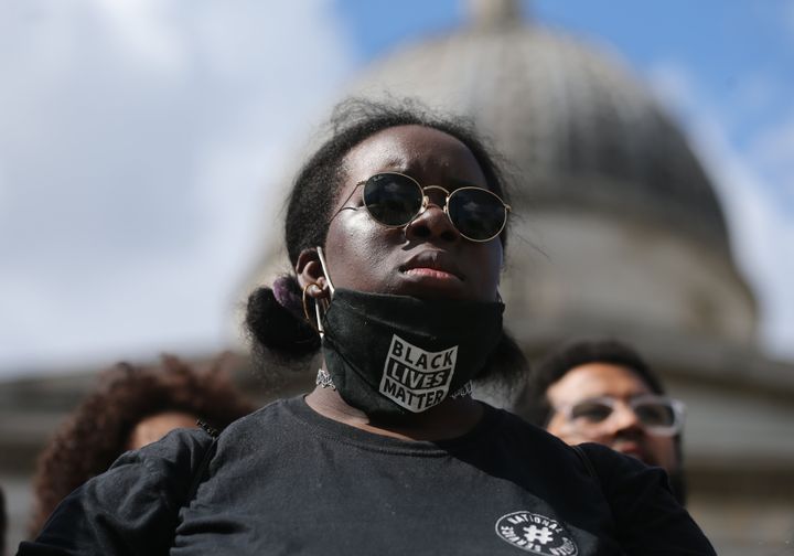 A demonstrator wearing a face mask at a Black Lives Matter protest in Trafalgar Square, London, on June 13
