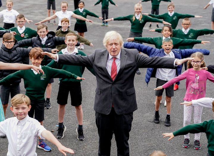 Boris Johnson joins a socially distanced lesson during a visit to Bovingdon Primary School in Bovingdon, Hemel Hempstead.