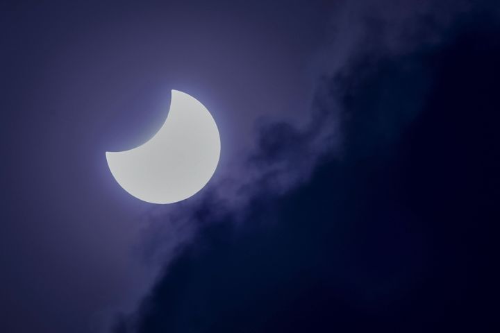 The moon partially covers the sun during an annular solar eclipse as seen from Bangalore on June 21, 2020. 