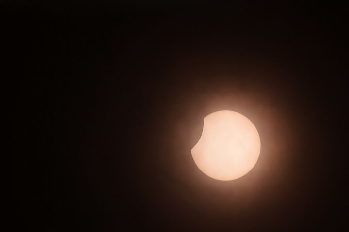 The moon partially covers the sun during an annular solar eclipse as seen from Colombo, Sri Lanka on June 21, 2020.