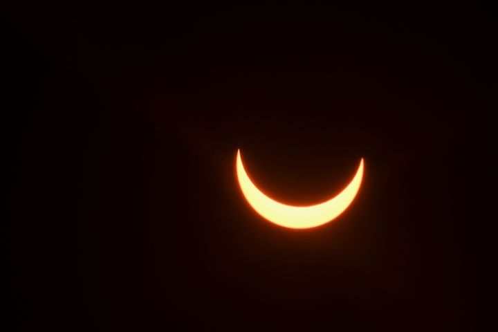 The moon partially covers the sun during an annular solar eclipse as seen from New Delhi on June 21, 2020. 