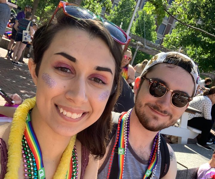 The author alongside their partner at Boston Pride 2019
