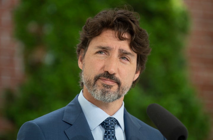 Prime Minister Justin Trudeau listens to a question during a news conference outside Rideau Cottage in Ottawa on June 22, 2020.