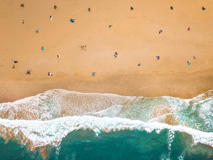 Social distancing is key everywhere, including at the beach.