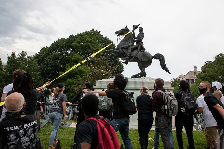 WASHINGTON, DC - JUNE 22: Protestors attempt to pull down the statue of Andrew Jackson in Lafayette Square near the White Hou
